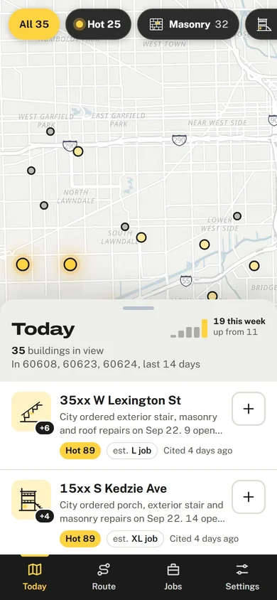 Fixablock on a phone: the map of today’s buildings above the first two leads.